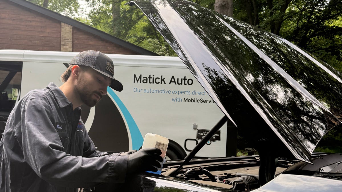 Matick Chevrolet Mobile Service technician performing service at a customer's home